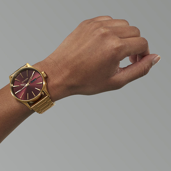 NIXON red/gold 20