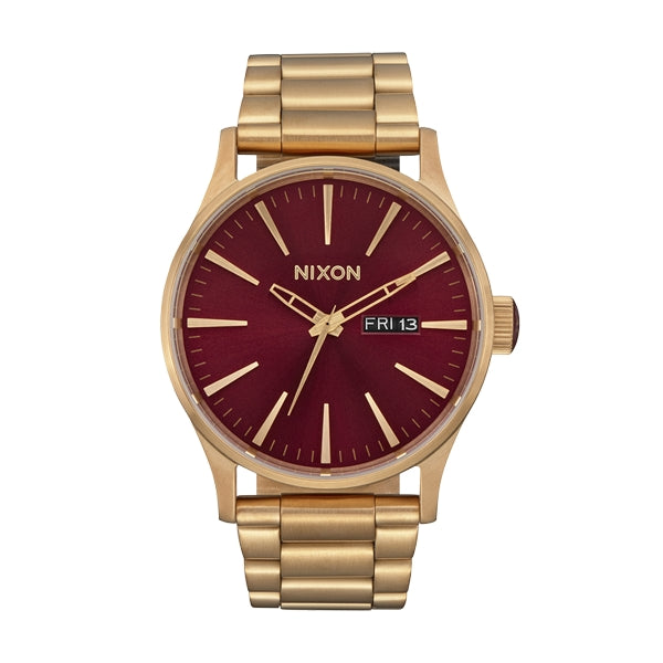 NIXON red/gold